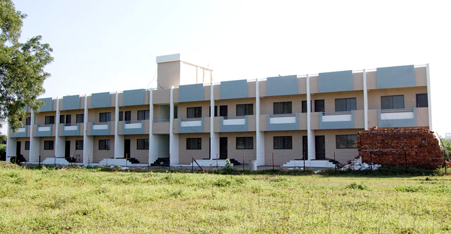 Two-storey residential apartment building with a long terrace front